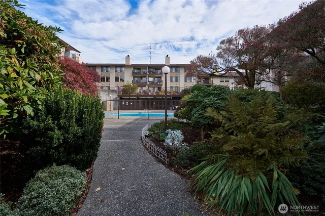 a view of a swimming pool with a patio