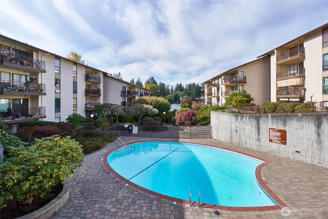 a view of a street with a trees in the background