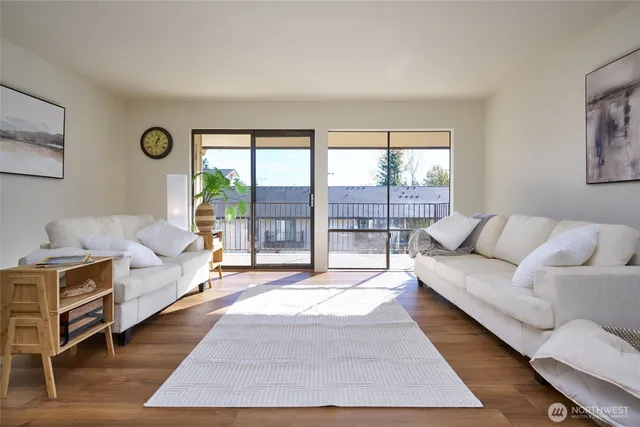 a bedroom with double bed and a window