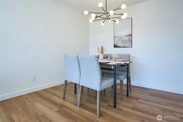 a bathroom with a sink mirror vanity and toilet