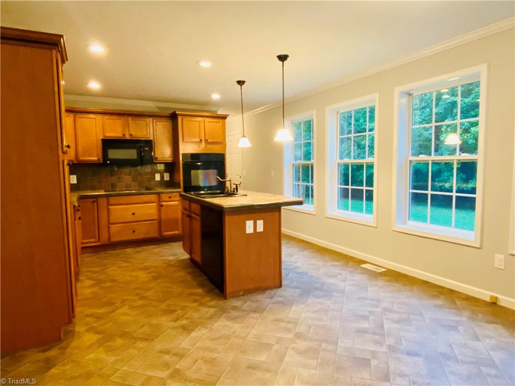 1783 Soapstone Mountain Road Staley, NC 27355 - Photo 9 of 38