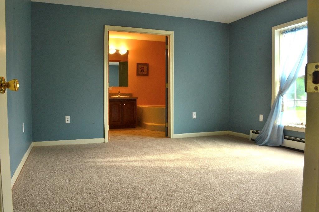 219 Range Road Cumberland, ME 04021 - Photo 15 of 21 Master bedroom with new carpet