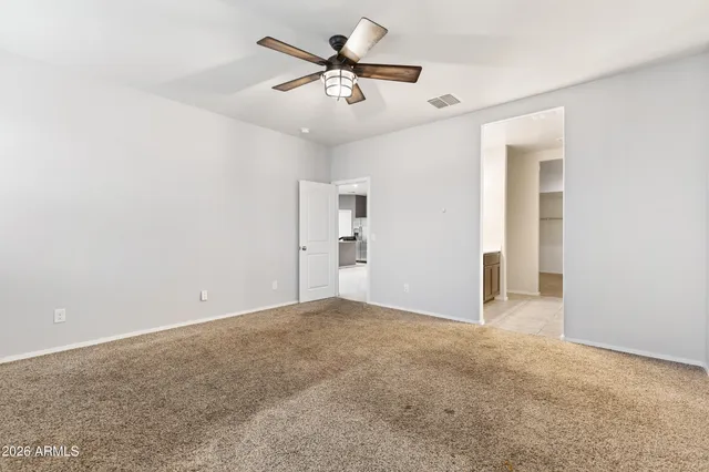 a bathroom with a double vanity sink and mirror