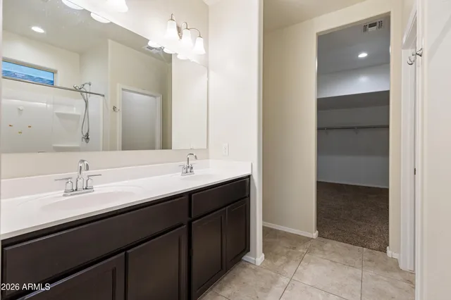 a bathroom with a shower and toilet