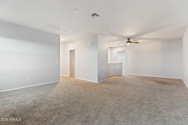 a bathroom with a double vanity sink toilet mirror and shower