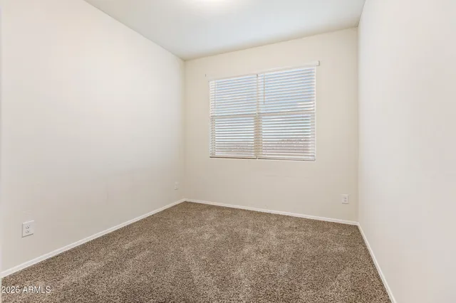 an empty room with closet