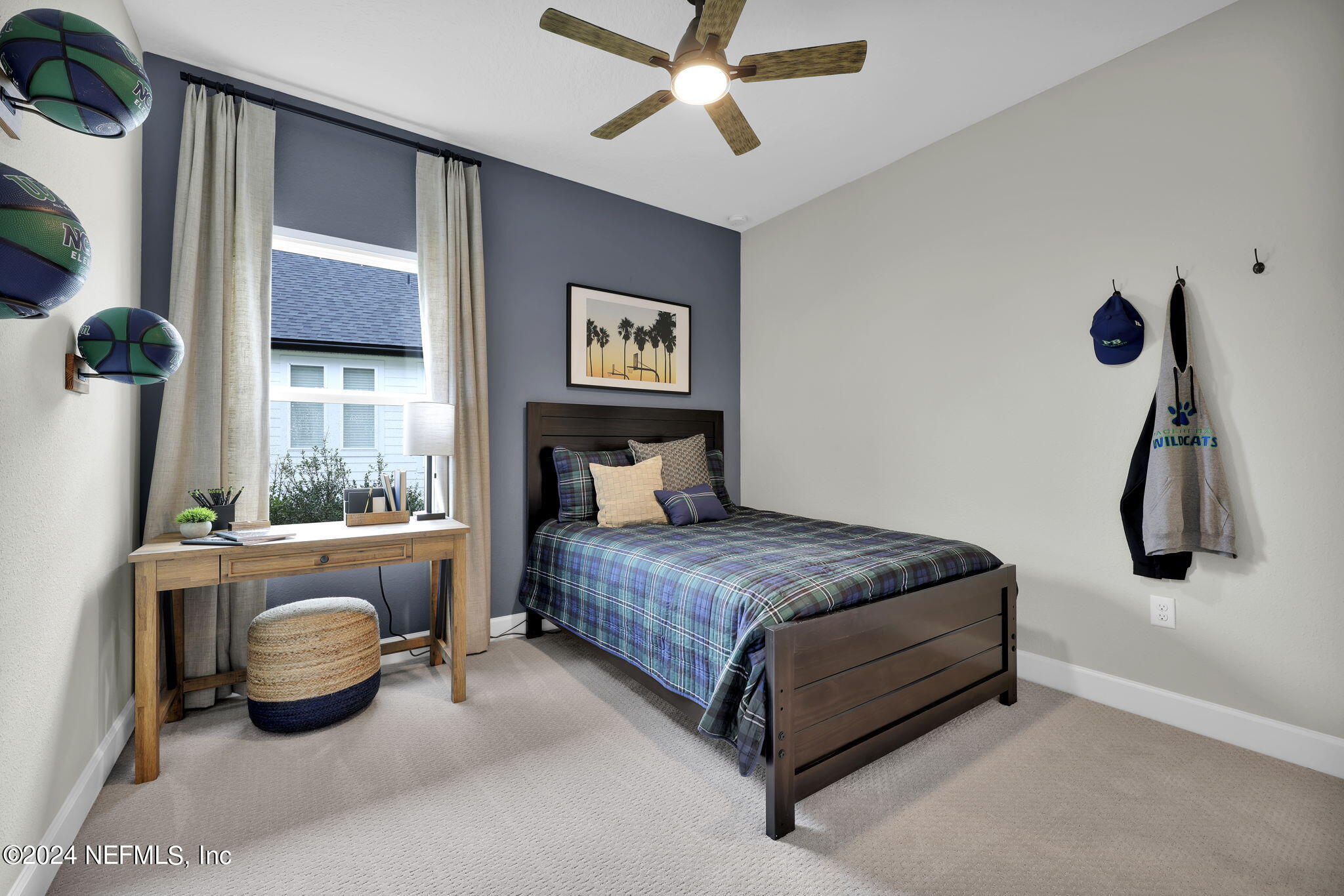 861 Goldenrod Drive St. Augustine, FL 32092 - Photo 17 of 83 a bedroom with a bed and a window