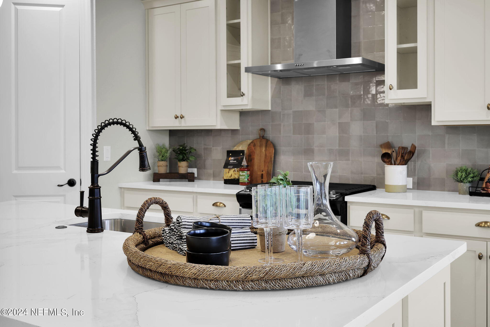 861 Goldenrod Drive St. Augustine, FL 32092 - Photo 42 of 83 a kitchen with sink a stove and cabinets