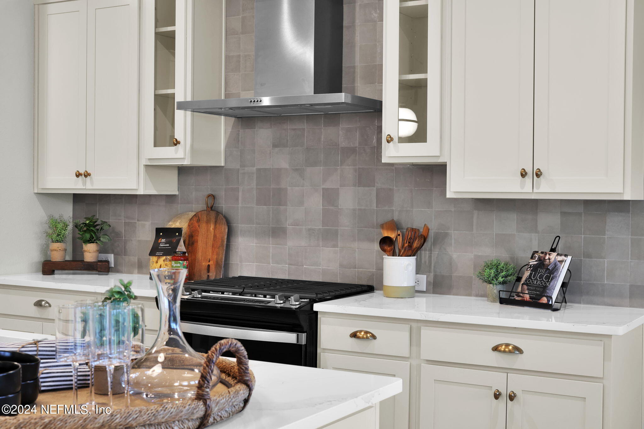 861 Goldenrod Drive St. Augustine, FL 32092 - Photo 43 of 83 a kitchen with stainless steel appliances granite countertop a sink stove and cabinets