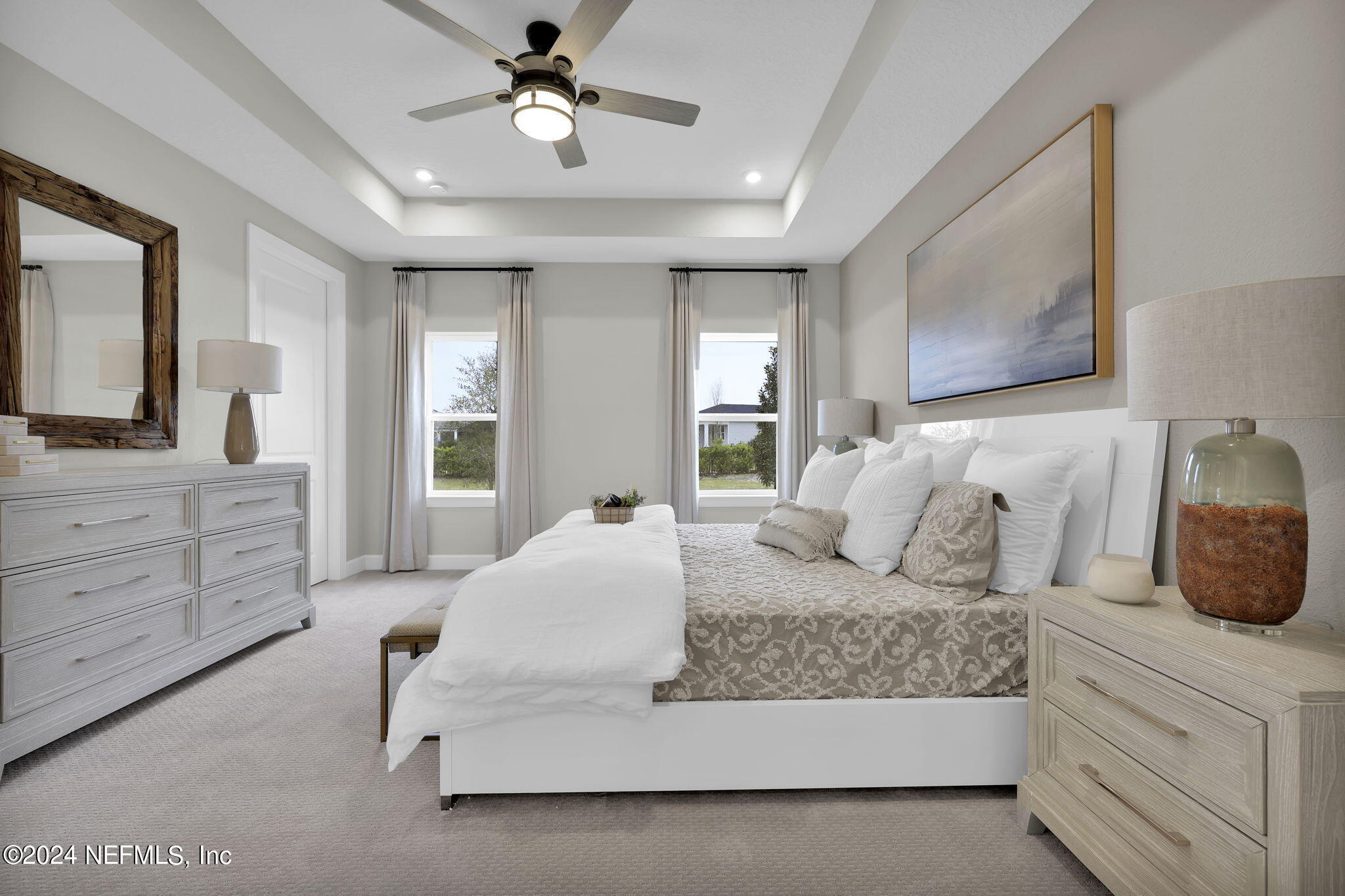 861 Goldenrod Drive St. Augustine, FL 32092 - Photo 66 of 83 a bedroom with a large bed and a dresser