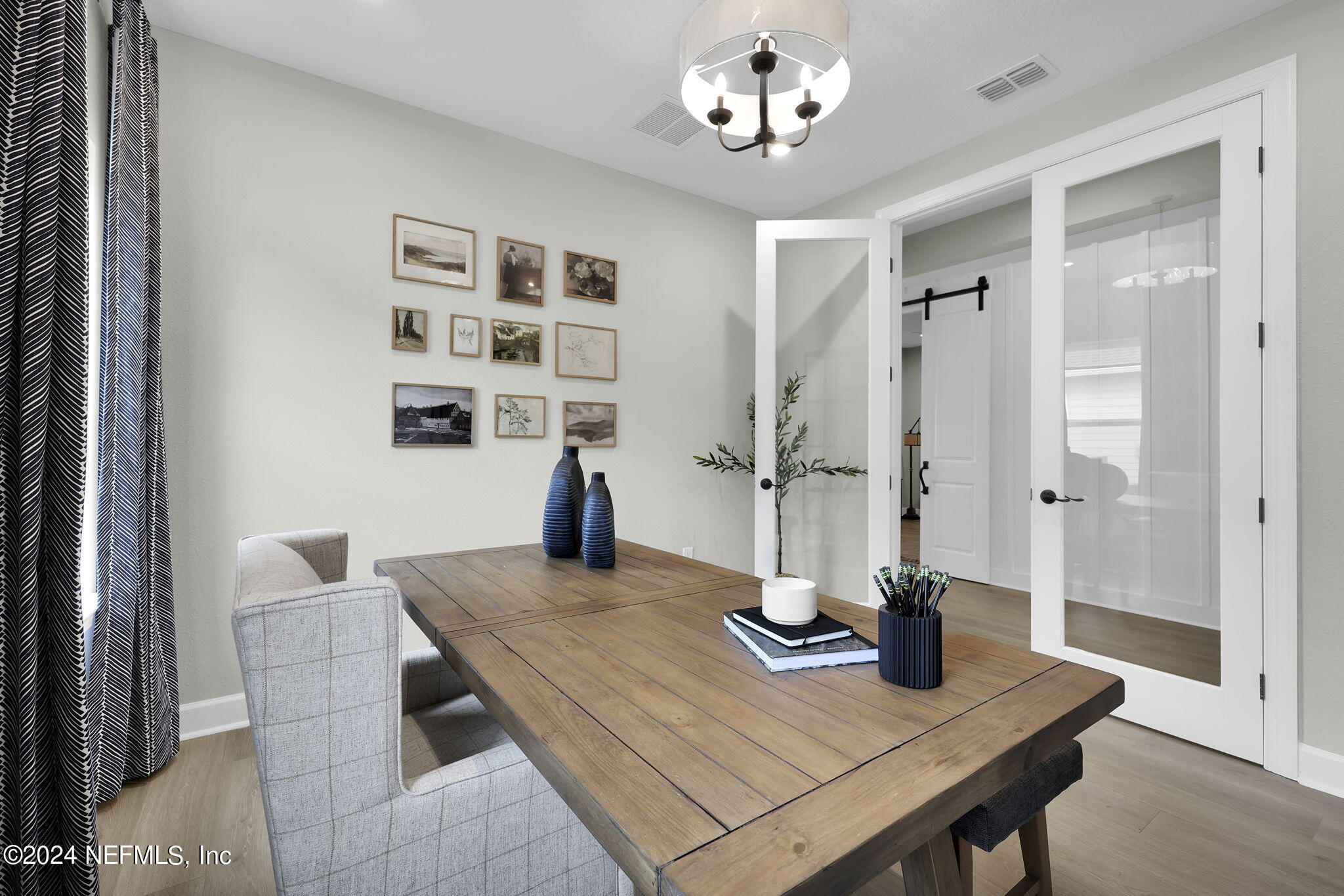 861 Goldenrod Drive St. Augustine, FL 32092 - Photo 75 of 83 a view of a dining room with furniture