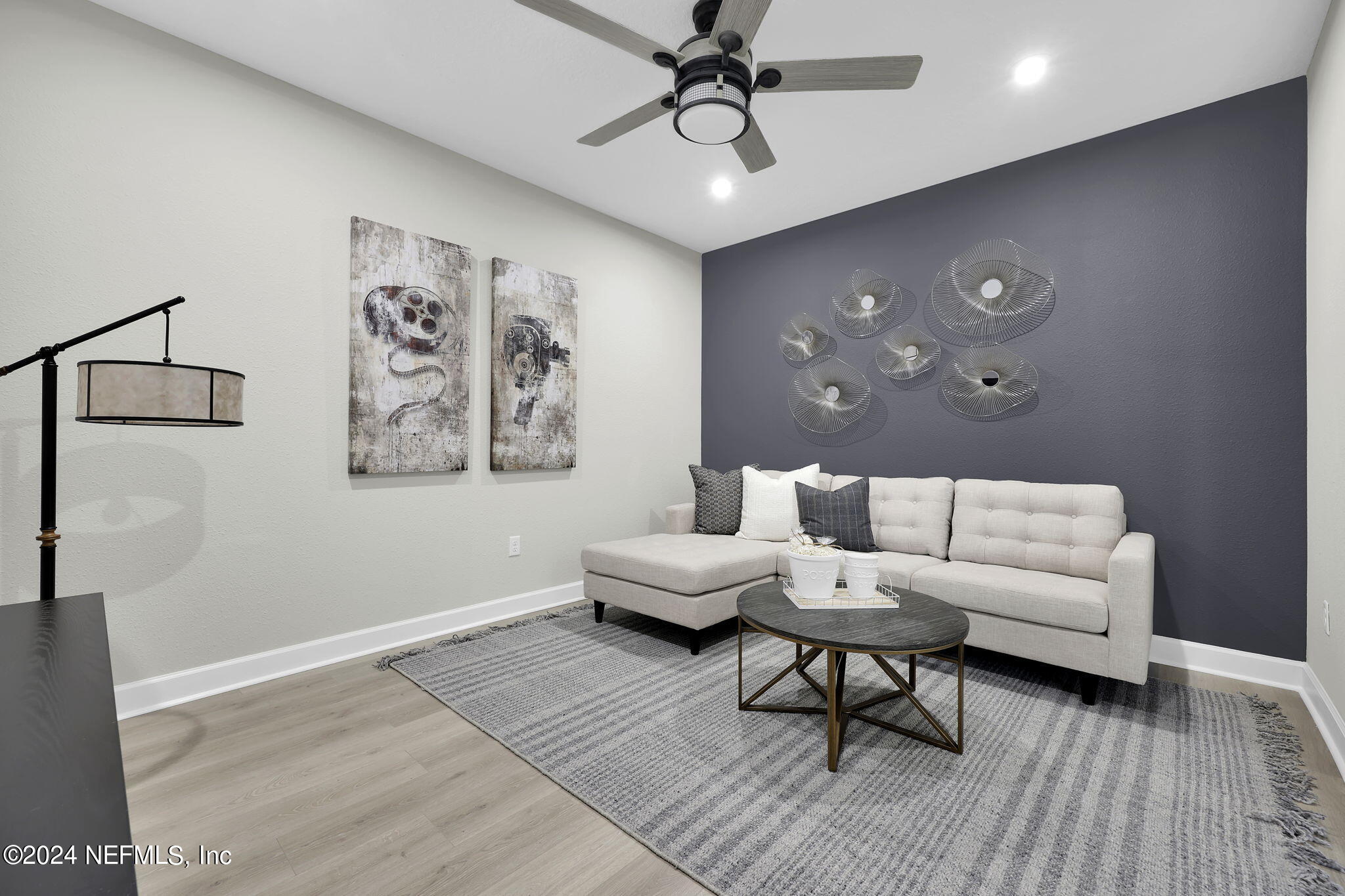 861 Goldenrod Drive St. Augustine, FL 32092 - Photo 79 of 83 a living room with furniture and wooden floor