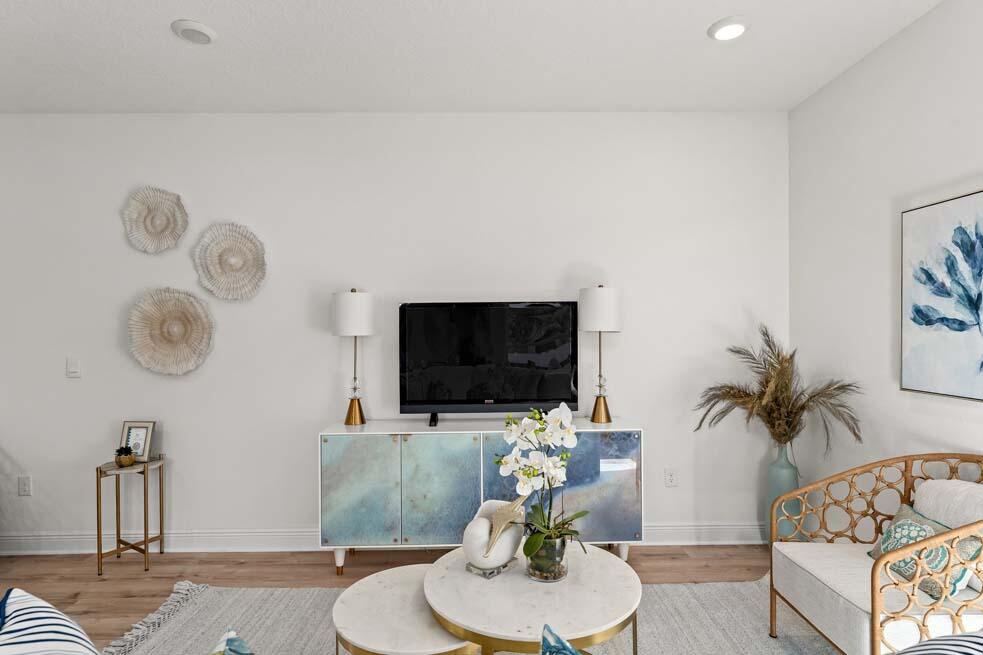 2 Redbird Loop Destin, FL 32541 - Photo 11 of 30 a living room with furniture and a flat screen tv