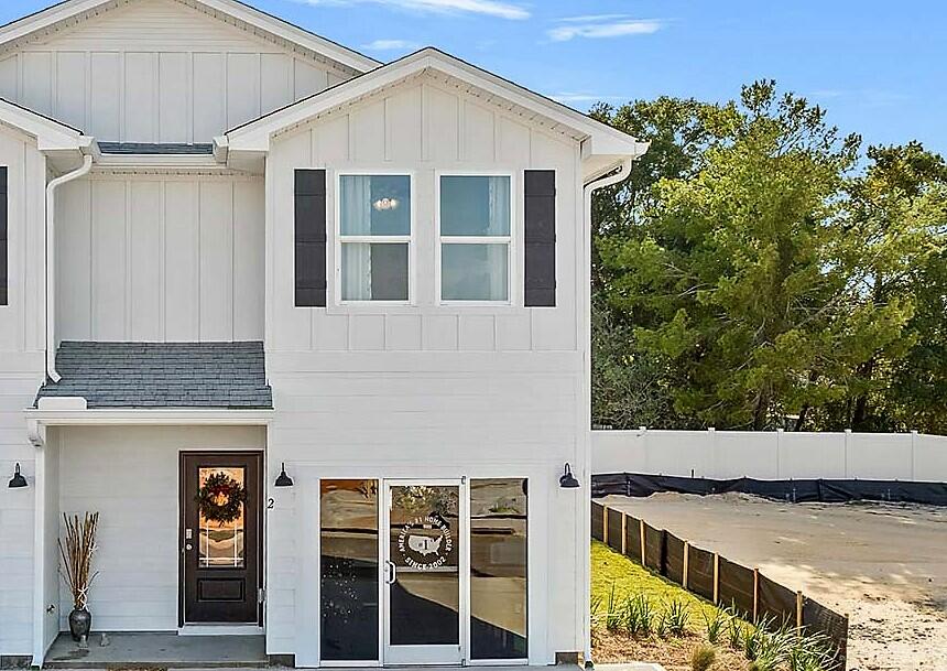 2 Redbird Loop Destin, FL 32541 - Photo 2 of 30 a view of a house with a garage