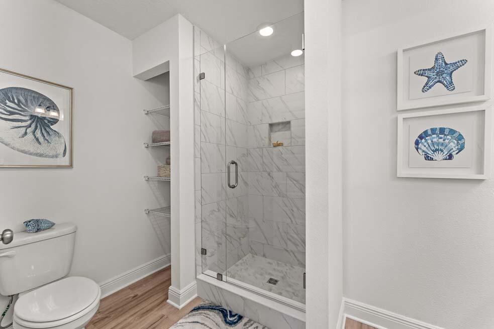 2 Redbird Loop Destin, FL 32541 - Photo 22 of 30 a bathroom with a shower and toilet