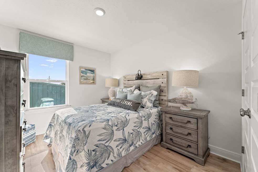 2 Redbird Loop Destin, FL 32541 - Photo 26 of 30 a bedroom with a bed and a window