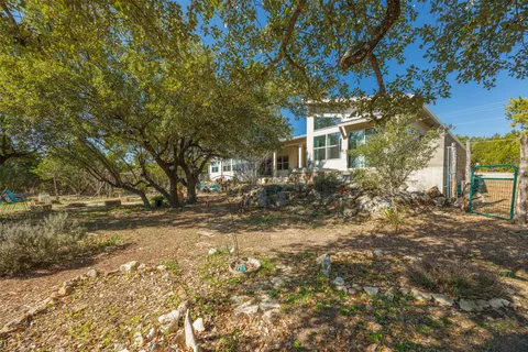 a bedroom with a bed and a mirror