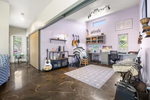 a living room with furniture and a table