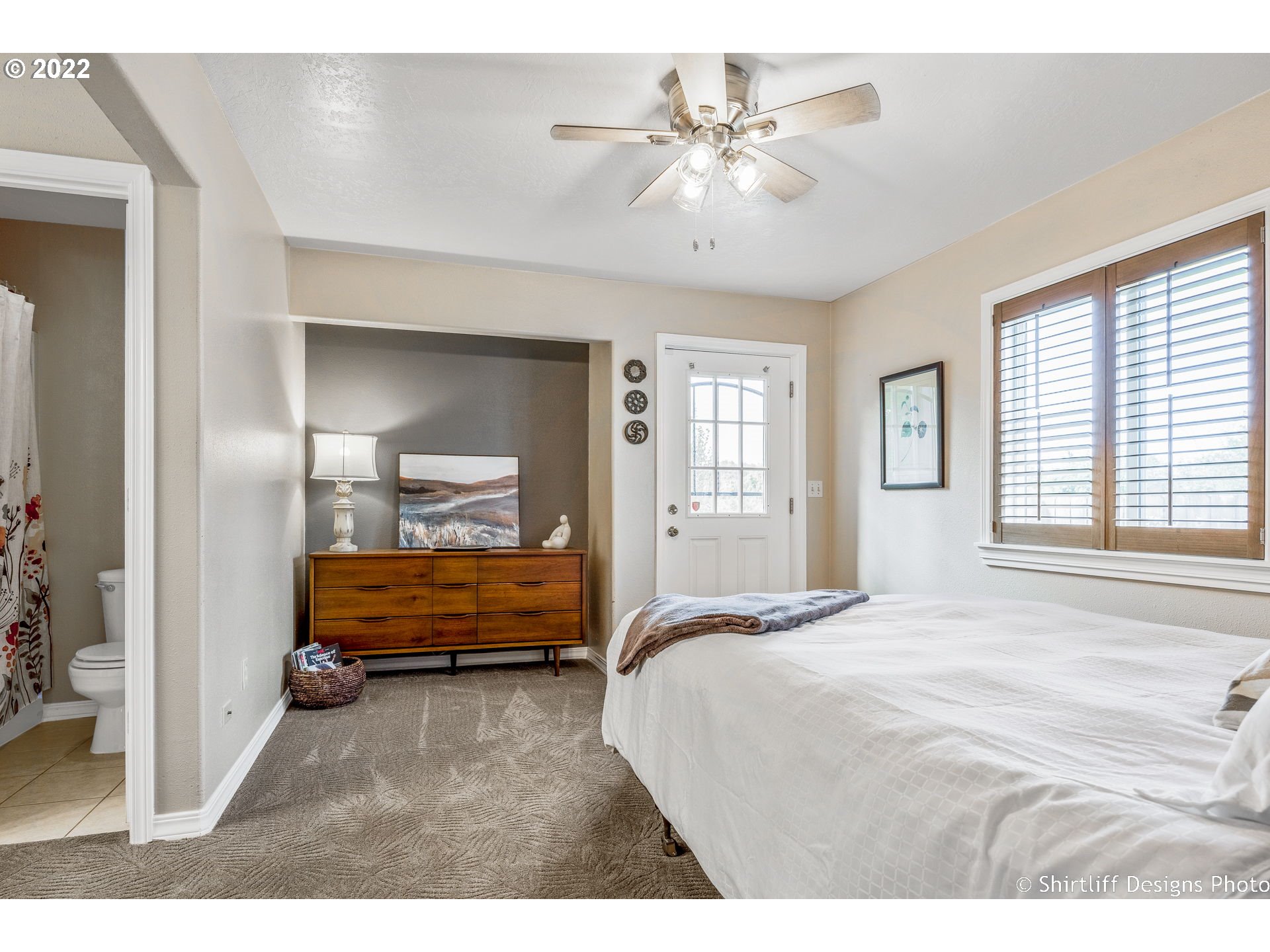 4313 Cole Way Springfield, OR 97478 - Photo 15 of 32 a bedroom with a bed and a chandelier