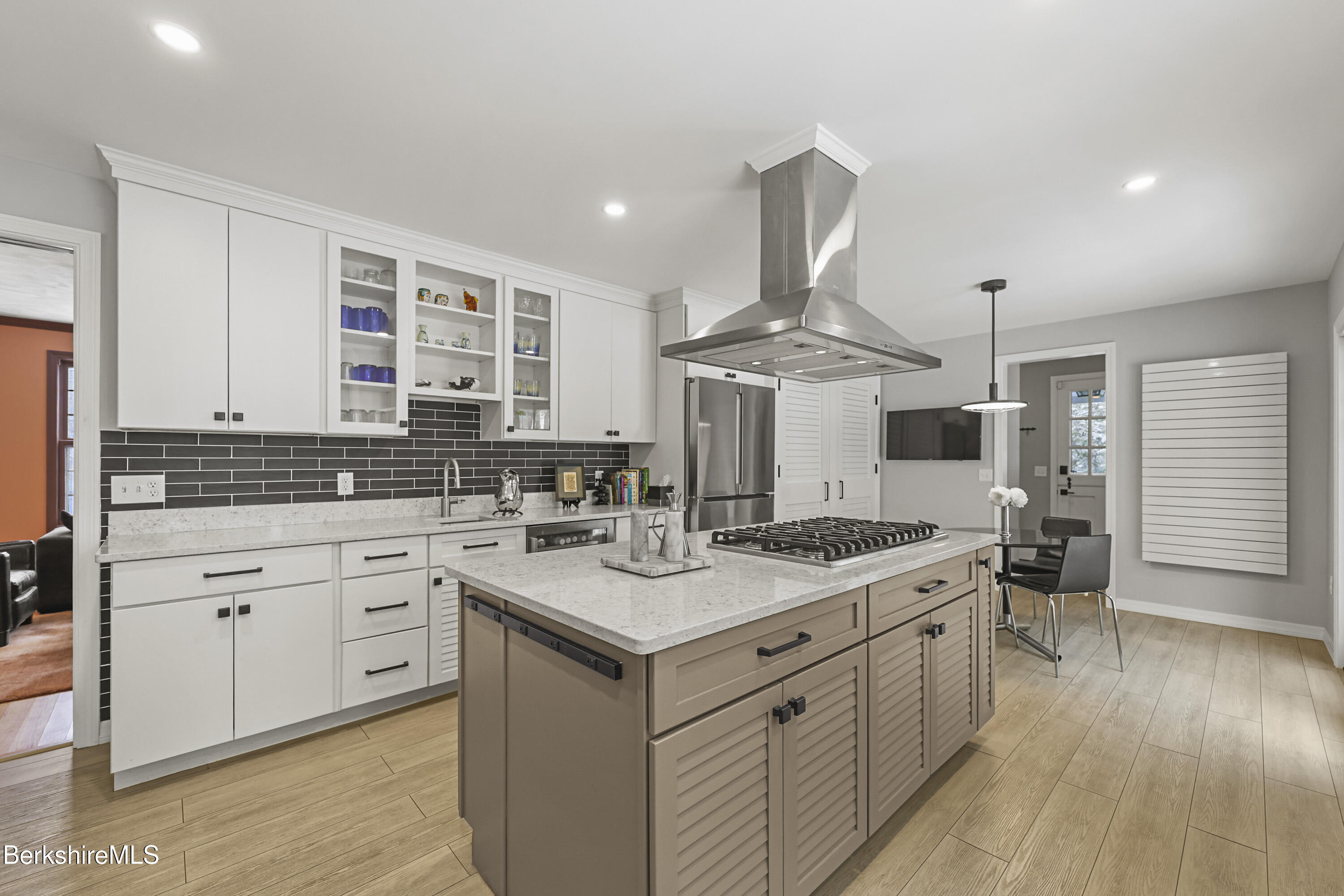 69 Gravesleigh Terrace Pittsfield, MA 01201 - Photo 32 of 84 a kitchen with a sink stove and cabinets