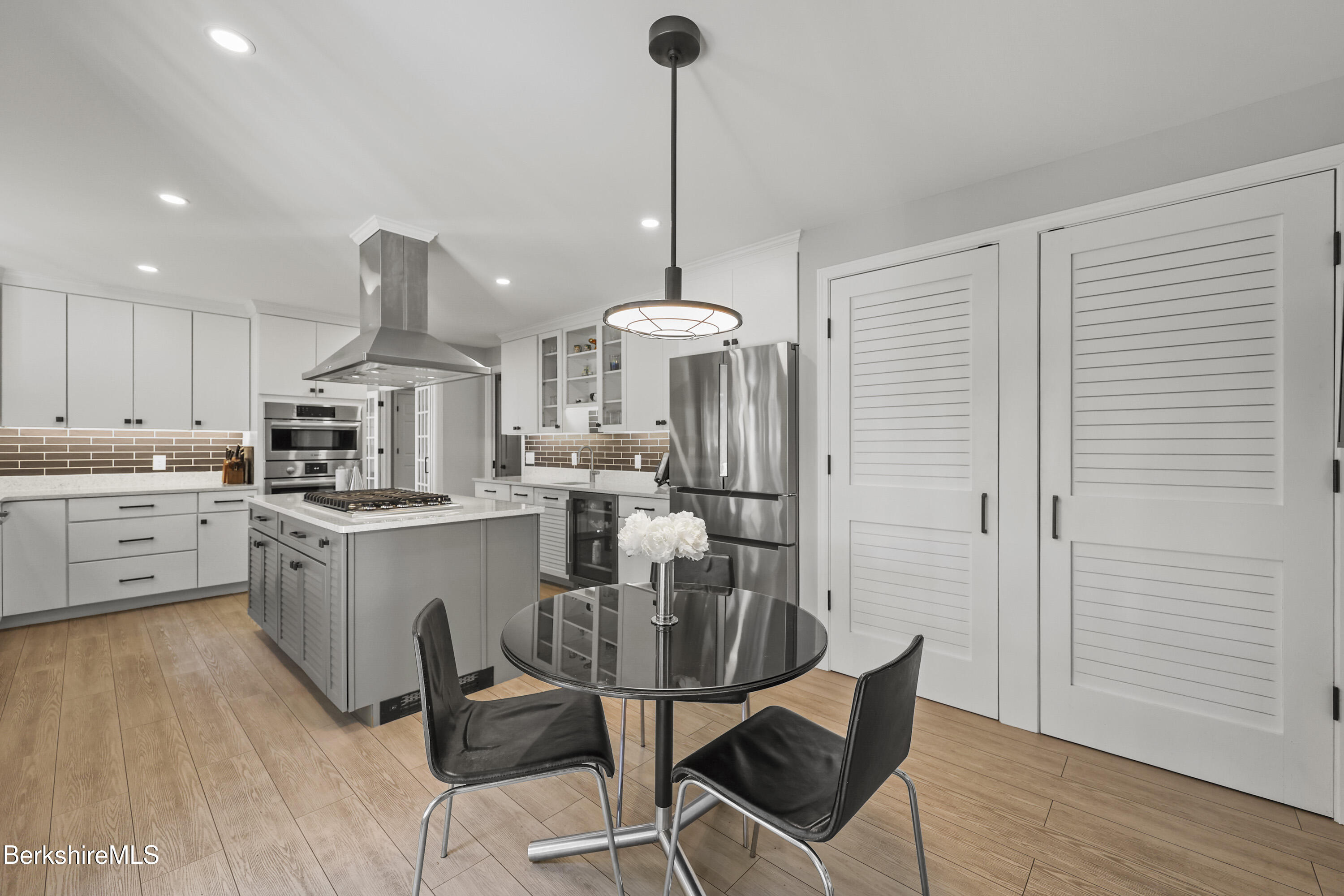 69 Gravesleigh Terrace Pittsfield, MA 01201 - Photo 38 of 84 a kitchen with stainless steel appliances granite countertop a kitchen island a stove a cabinets a sink and a chairs