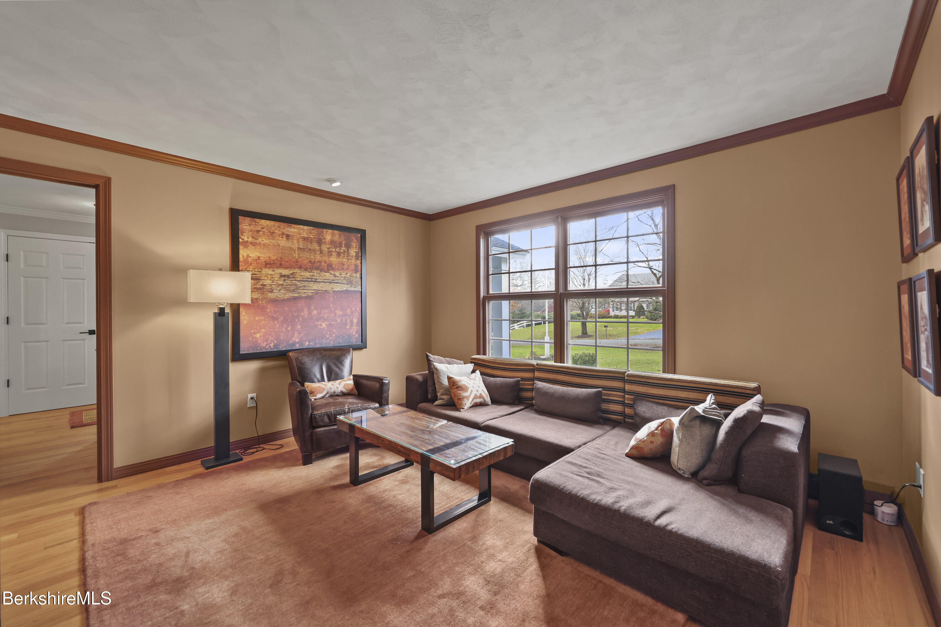 69 Gravesleigh Terrace Pittsfield, MA 01201 - Photo 43 of 84 a living room with furniture and a window