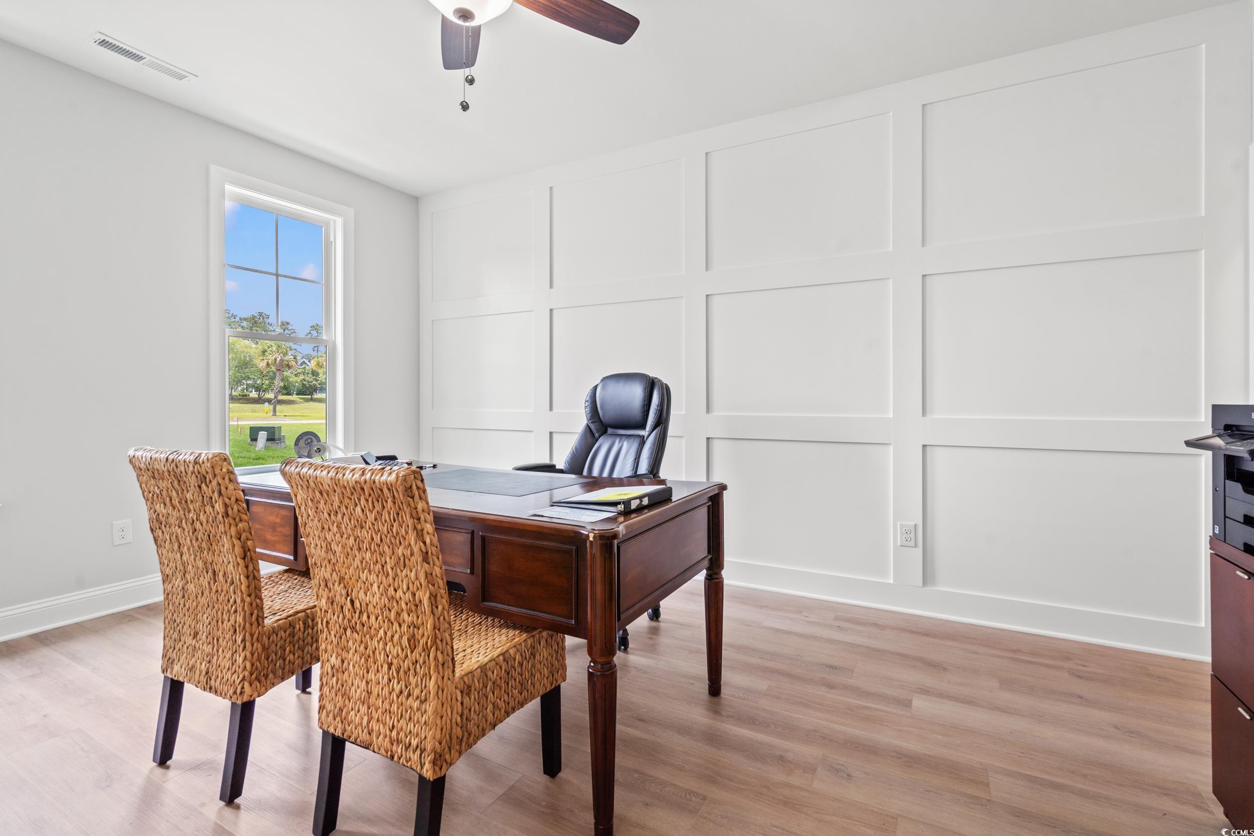 852 Commanders Island Road Georgetown, SC 29440 - Photo 16 of 37 Office space featuring a decorative wall, ceiling fan, light wood-style floors, and baseboards