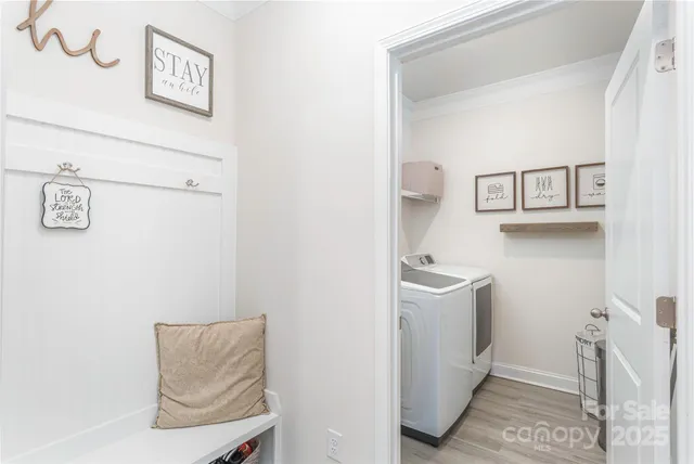 a utility room with dryer and washer