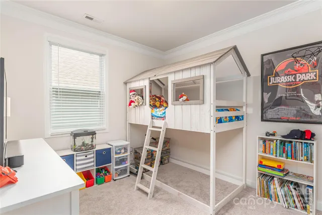 a view of a workspace with furniture and toys