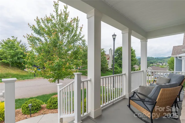 a view of a two chair in the balcony