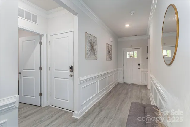 wooden floor with white walls