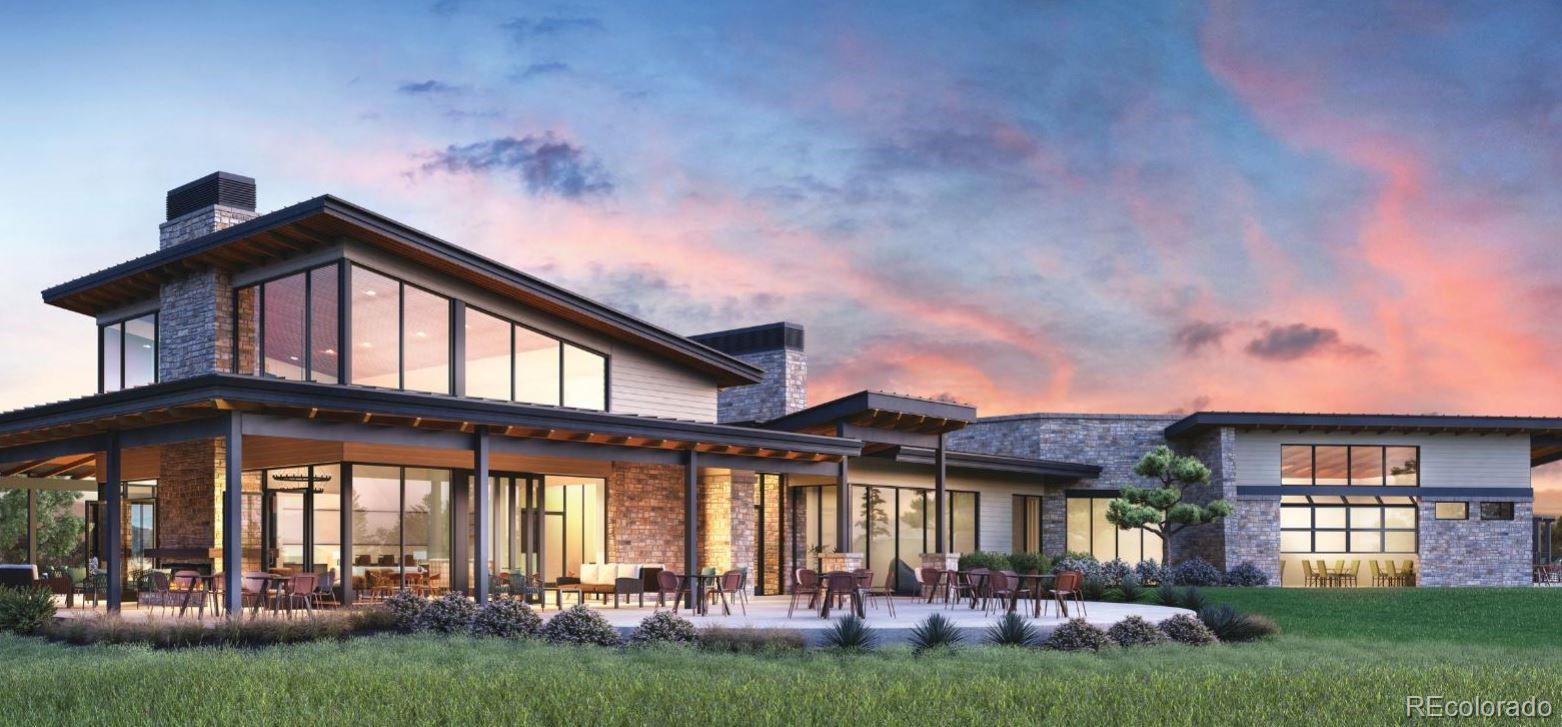 624 Simmental Loop Castle Rock, CO 80104 - Photo 9 of 9 a front view of a house with a garden and yard