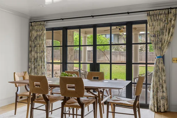 a view of a dining room with furniture window and outside view