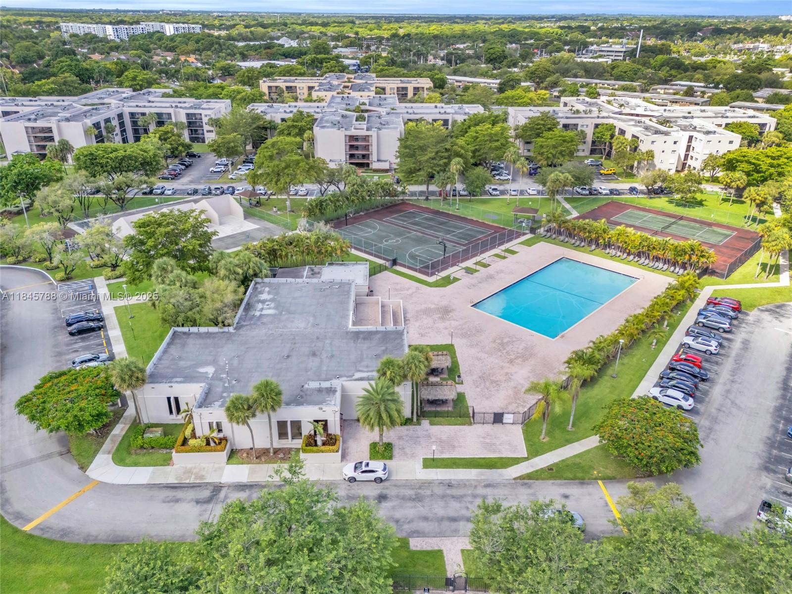8760 Southwest 133rd Avenue Road, Unit 108 Miami, FL 33183 - Photo 12 of 39 an aerial view of residential houses with outdoor space and parking