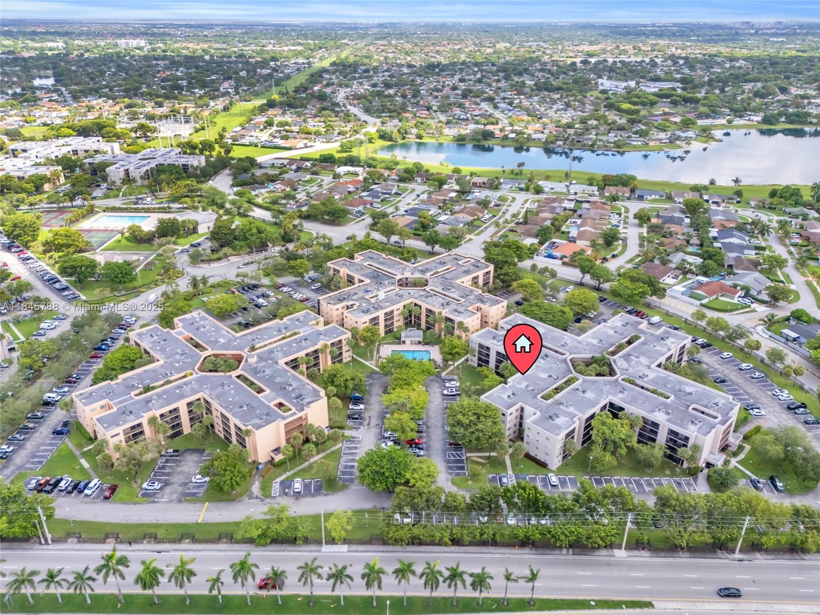 8760 Southwest 133rd Avenue Road, Unit 108 Miami, FL 33183 - Photo 15 of 39 an aerial view of residential houses with outdoor space