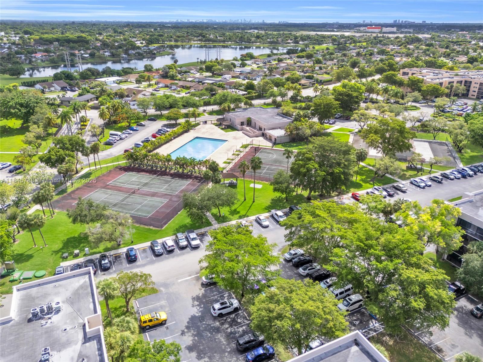 8760 Southwest 133rd Avenue Road, Unit 108 Miami, FL 33183 - Photo 19 of 39 an aerial view of residential houses with outdoor space