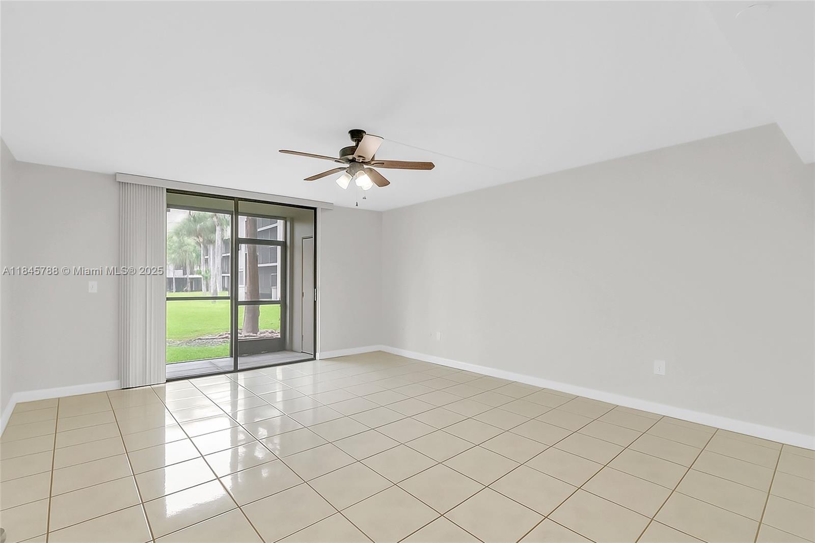 8760 Southwest 133rd Avenue Road, Unit 108 Miami, FL 33183 - Photo 22 of 39 a view of an empty room and window
