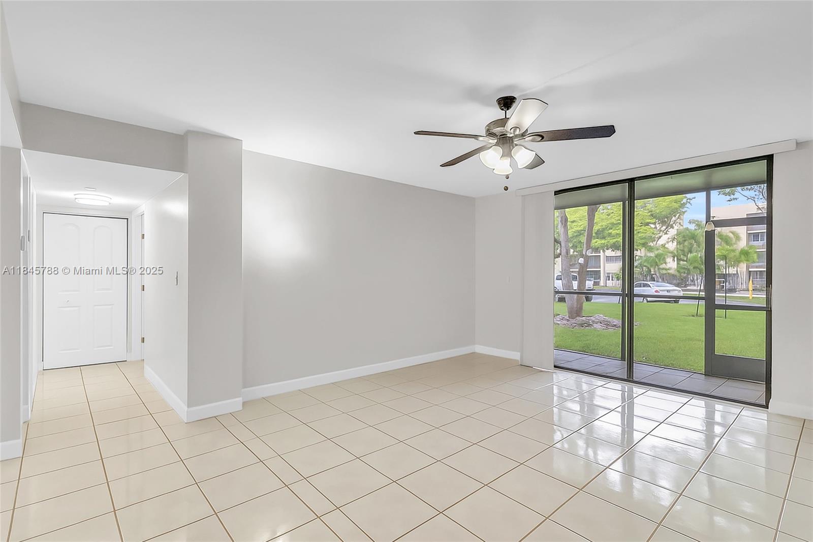 8760 Southwest 133rd Avenue Road, Unit 108 Miami, FL 33183 - Photo 23 of 39 a view of an empty room with a window