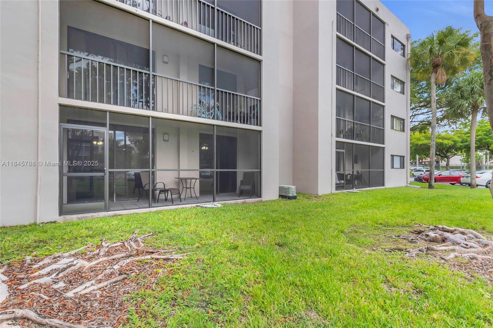 8760 Southwest 133rd Avenue Road, Unit 108 Miami, FL 33183 - Photo 36 of 39 a view of an apartment with a backyard