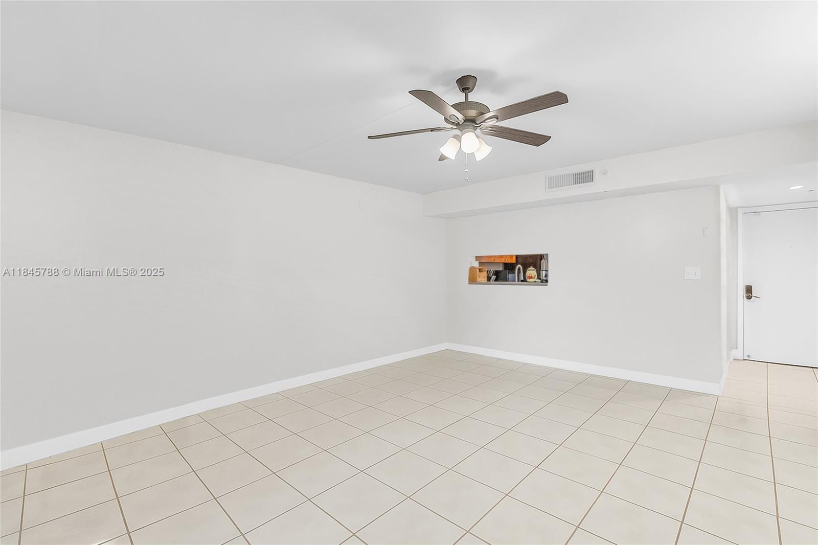 8760 Southwest 133rd Avenue Road, Unit 108 Miami, FL 33183 - Photo 5 of 39 a view of an empty room