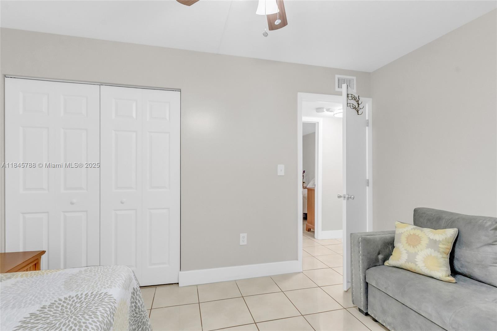 8760 Southwest 133rd Avenue Road, Unit 108 Miami, FL 33183 - Photo 7 of 39 a room that has a bed in it