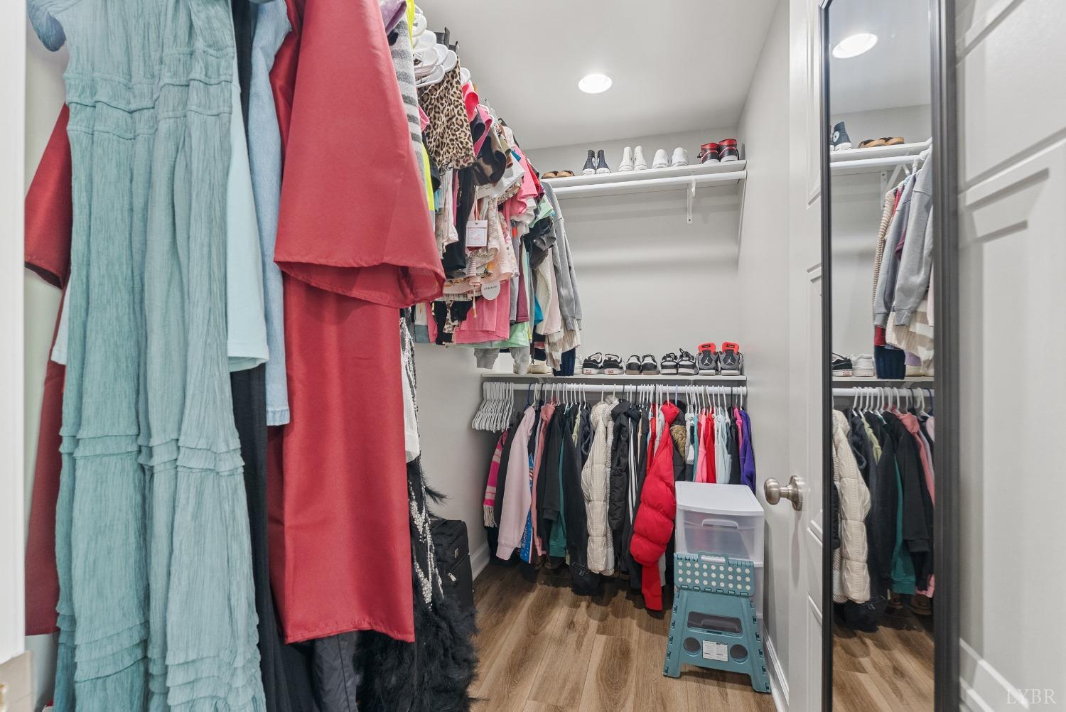 4607 Lowry Road Goode, VA 24556 - Photo 27 of 64 a view of walk in closet with clothes