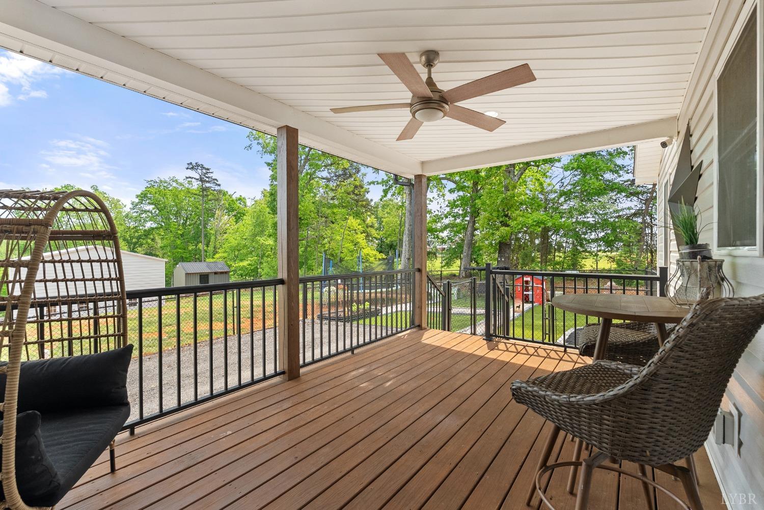 4607 Lowry Road Goode, VA 24556 - Photo 42 of 64 a view of a balcony with furniture