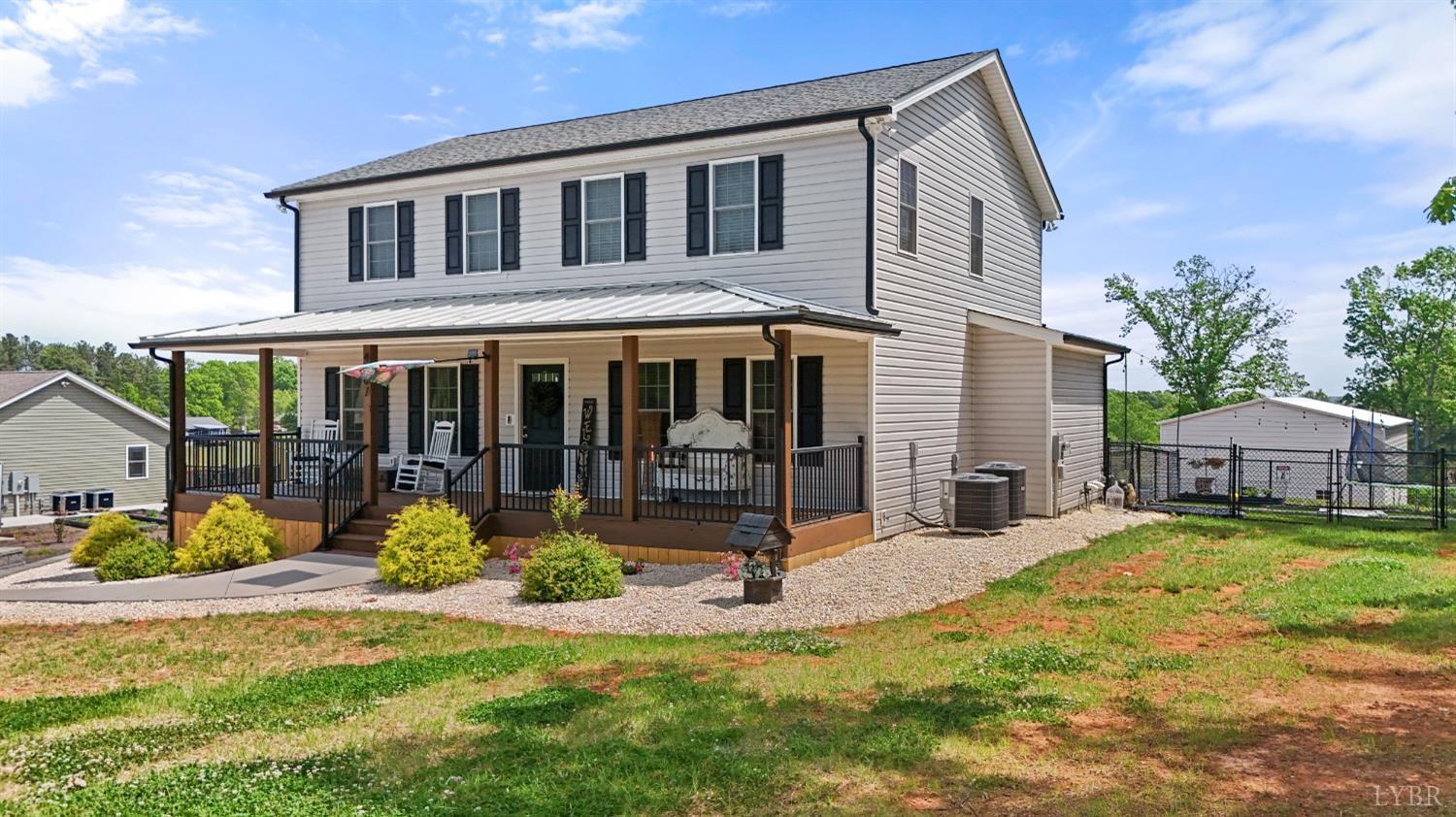 4607 Lowry Road Goode, VA 24556 - Photo 60 of 64 a view of a house with yard and sitting area