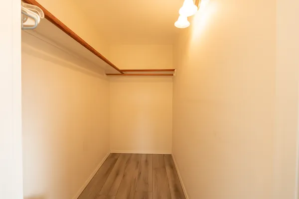 a view of small space with wooden floor