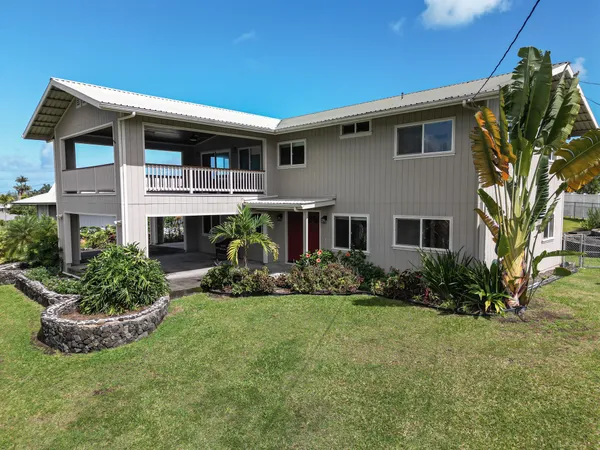 a house view with a garden space