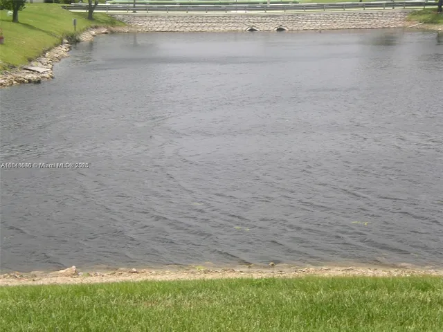 a view of swimming pool from a yard