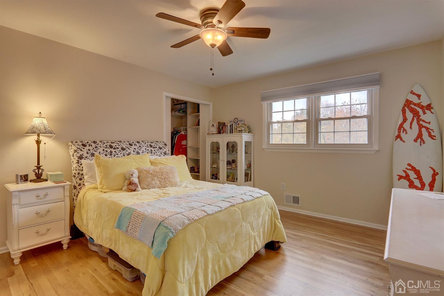 5 Revock Road East Brunswick, NJ 08816 - Photo 14 of 20 a bedroom with a bed and a closet