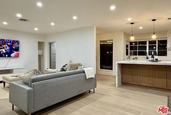 an aerial view of house with yard