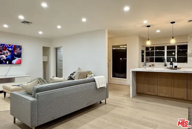 an aerial view of house with yard